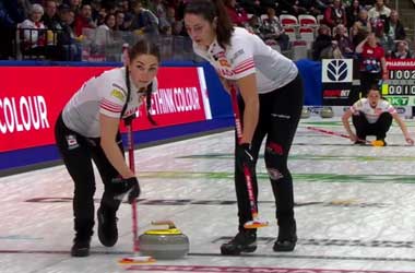 Canada Advances in Women’s Curling After Extra-End Loss